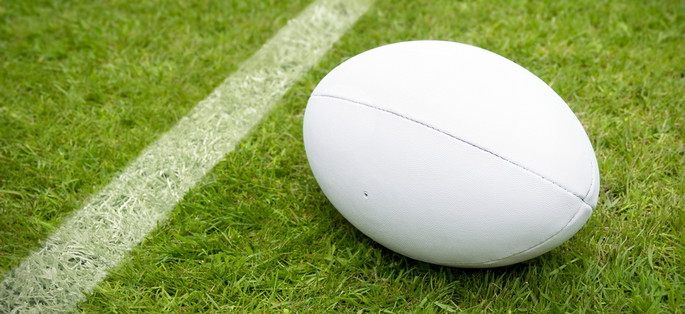 Rugby Ball on Pitch