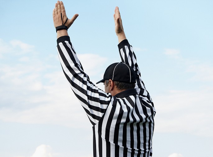 American Football Referee Signalling Touchdown
