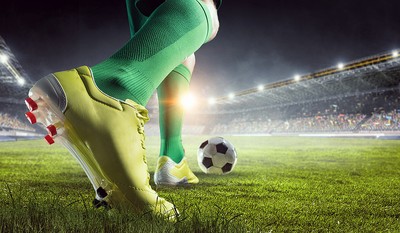 Close Up of Yellow Football Boots in Game