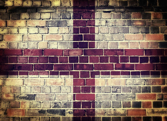 Faded England Flag on Brick Wall