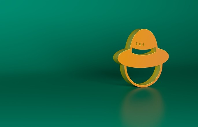 Explorer Hat Icon Against Green Background