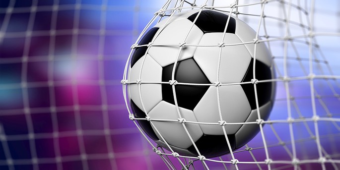 Football Hitting Net Against Purple Background