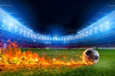 Football in Flames Running Across Pitch
