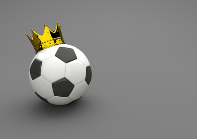Football with Crown Against Grey Background