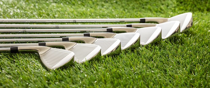 Golf Clubs Lying on Grass