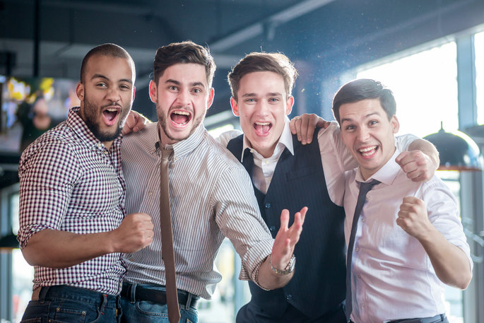 Group of Men Celebrating