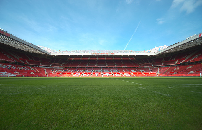Pitchside View of Manchester United's Old Trafford Stadium