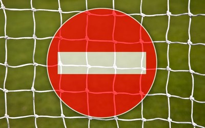 No Entry Sign Against Football Goal Net