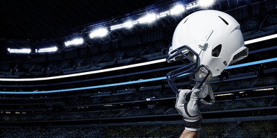 Raised American Football Helmet in Stadium